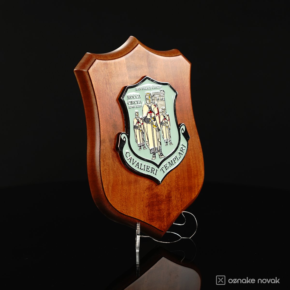 Wooden shield plaque with a pale green relief emblem of the Knights Templar, Cavalieri Templari